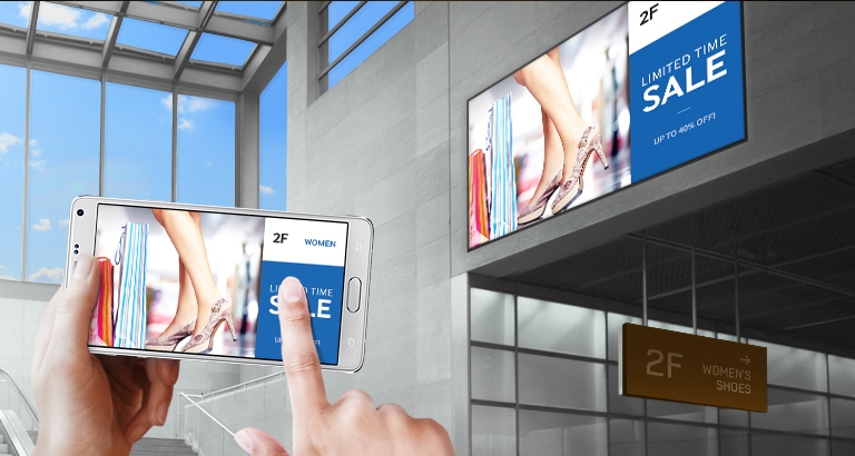 Manage digital signage wirelessly, using a compatible mobile device