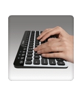 Hands typing on Bluetooth Easy-Switch Keyboard