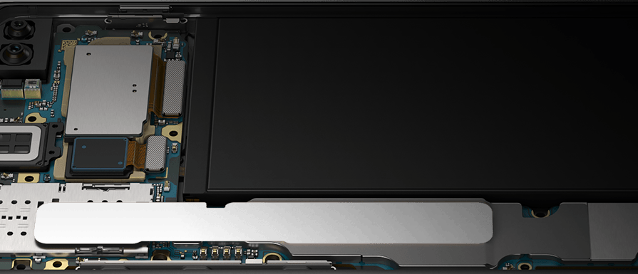 Galaxy S10 plus in landscape mode, propped up at a slight angle from the Bixby and volume button side with the interior hardware revealed, showing the pieces that make Galaxy S10 plus optimized for gaming.