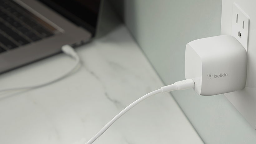 BOOSTCHARGE USB-C GaN Wall Charger plugged into an outlet