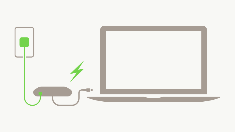 Illustration of USB-C to Ethernet + Charge Adapter charging a laptop