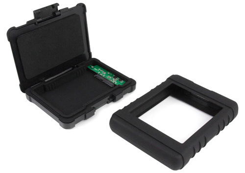 Photo of rugged enclosure shown open with protective silicone sleeve beside