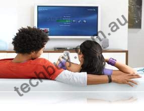 Two people watching Media Center