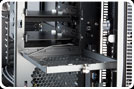 Front-accessible flip-down drive cage