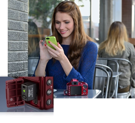 Nikon D3300 photo of a woman at an outdoor cafe with her smartphone and D3300 with WU-1a