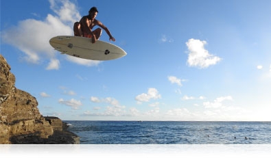 Shoot up to 7 continuous frames per second COOLPIX P900 photo of a surfer in air over the water