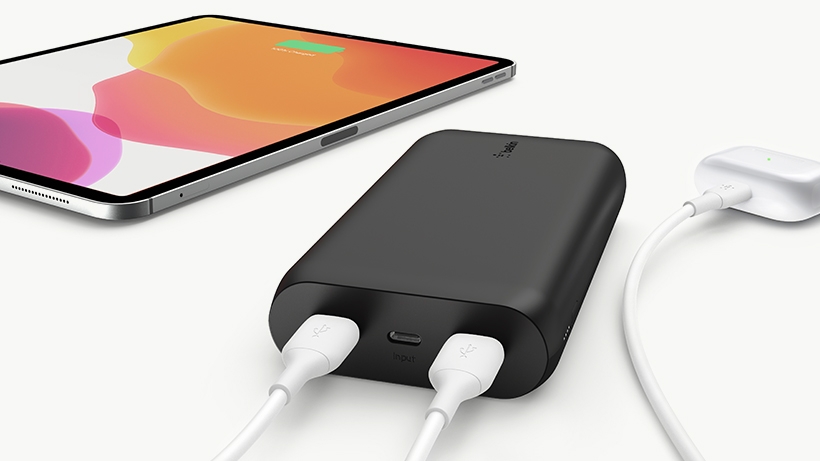Two devices plugged into the BOOSTCHARGE Power Bank 20K