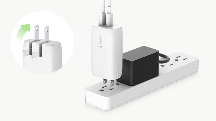 BOOSTCHARGE Wall Charger being plugged into a power strip