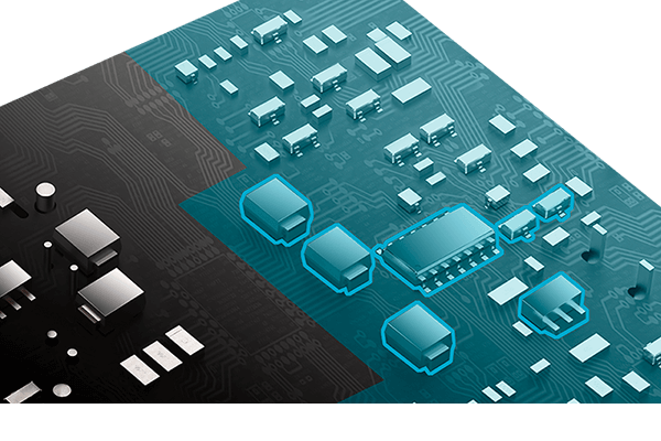 Close-up of a computer circuit board with a layer of blue covers to showcase the protective PCB coating on the PCB.