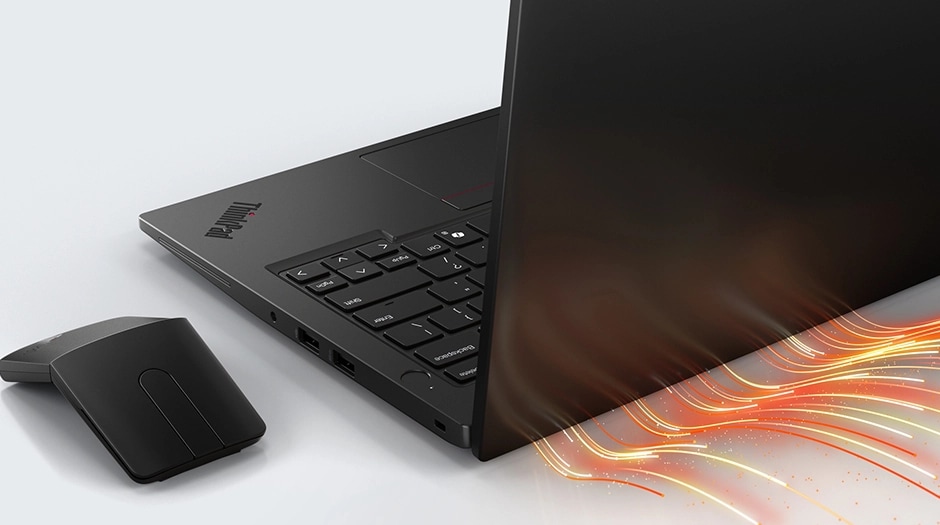 Lenovo ThinkPad L14 Gen 6 (14" AMD) laptop on a desk with a wireless mouse  right-rear view, lid open, with red, yellow, and orange graphics representing heat dissipating from the rear vents